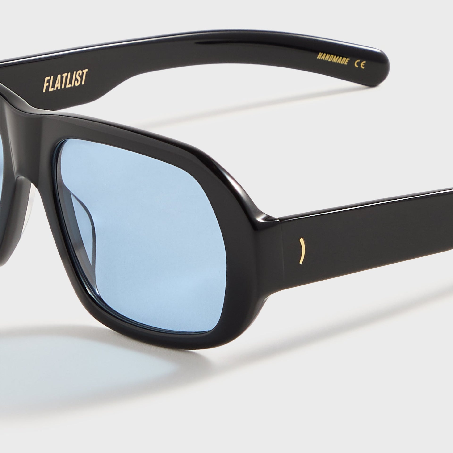 Flatlist Ford in Solid Black / Solid Blue Lens