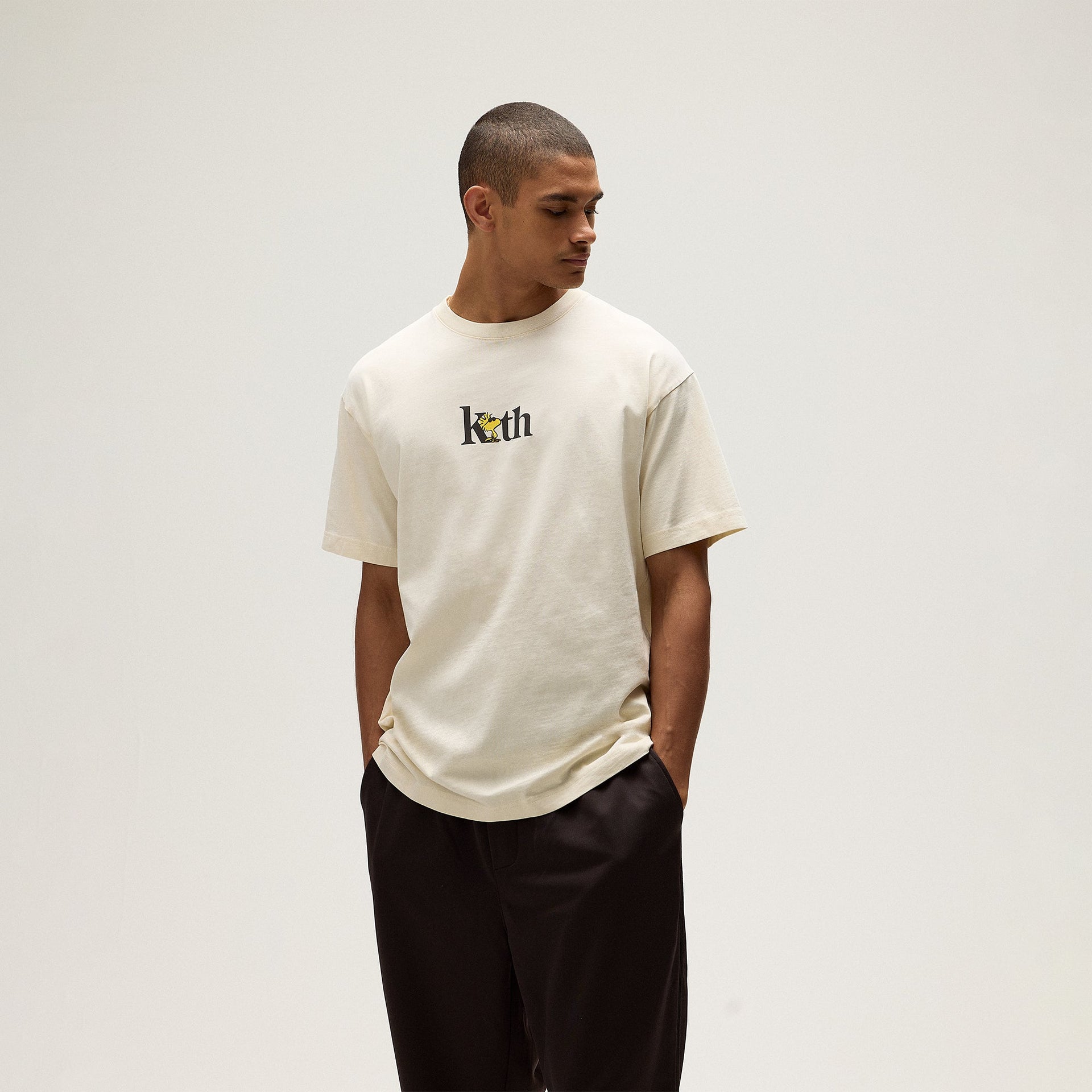 Kith for Peanuts Woodstock Serif Tee - Sandrift