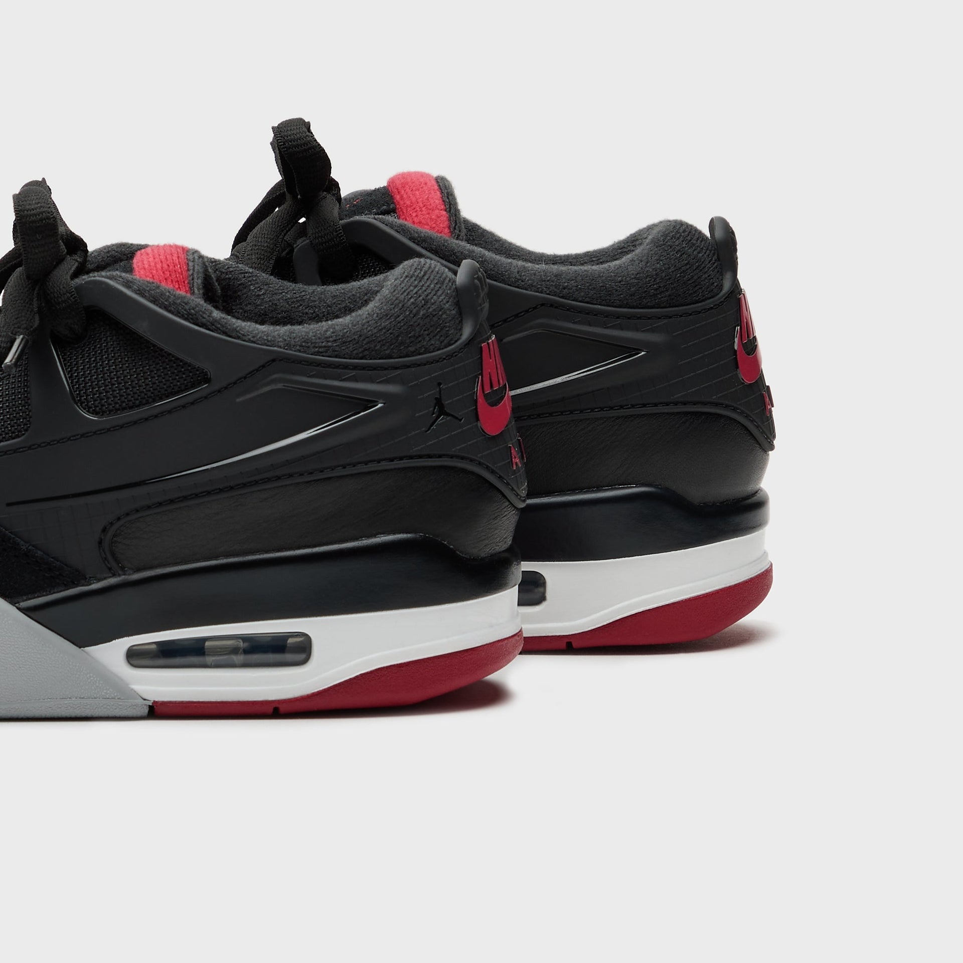 Jordan Air Jordan 4 RM - Black / Varsity Red / Wolf Grey / White