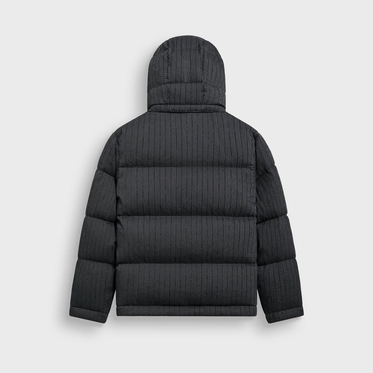 Kith Pleated Tech Maverick Puffer in charcoal, back view, with hood