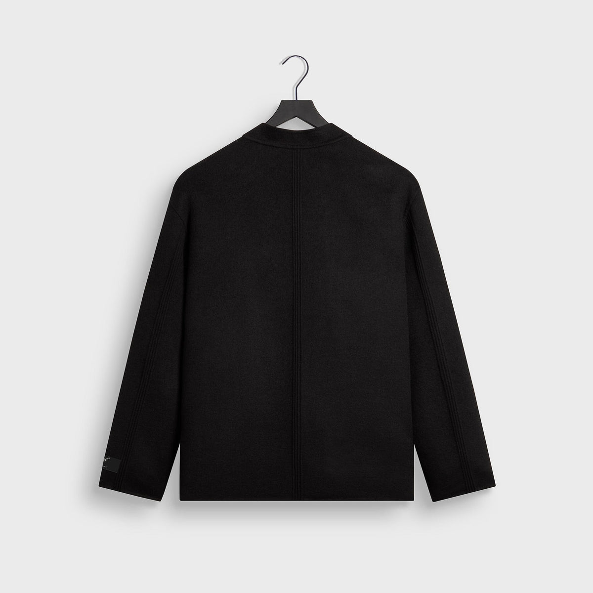 Kith Double-Face Wool Wes Jacket in black, back view, plain collarless wool jacket