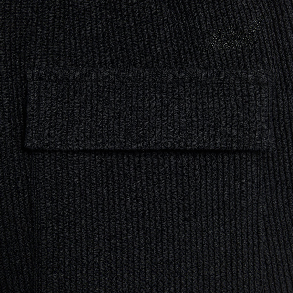 Close-up of the side pocket on the black Heavy Crepe Elmhurst pant
