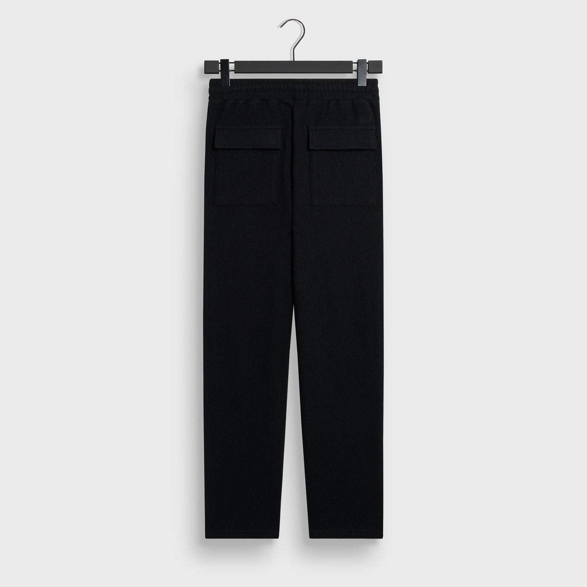 Kith Heavy Crepe Elmhurst Pant in black, back view, with welt back pockets