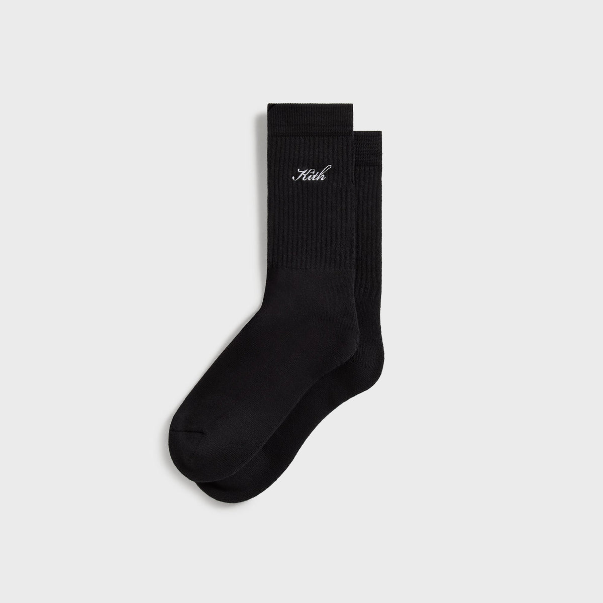 Kith Script Classic Crew Socks in black, pair with white Kith script and KITH box logo